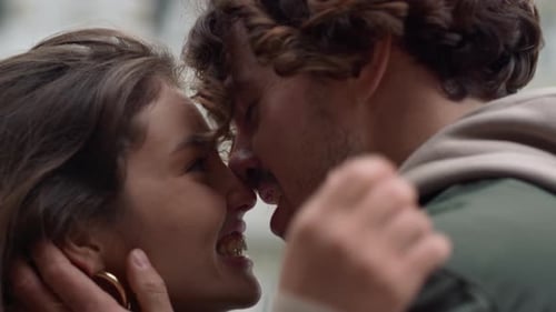 Playful Couple Having Fun in City