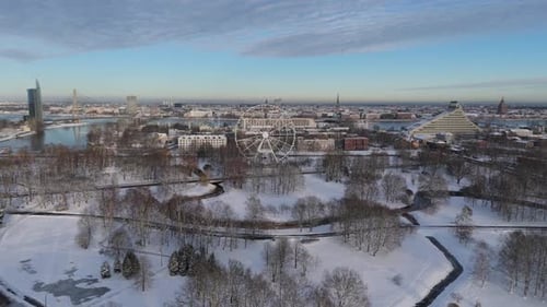 Latvia, Riga Winter Aerial View of City Skyline, Ferris Wheel, Riga Castle, Old Town Daugava River