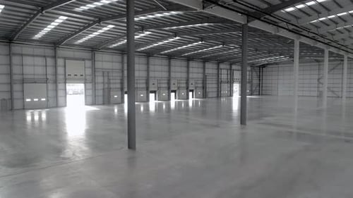 New Warehouse Interior View Showing an Empty Facility