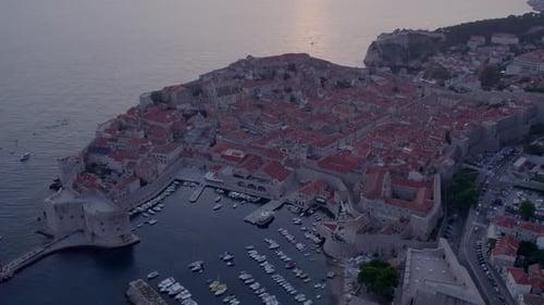 Aerial view of old city Dubrovnik by Adriatic Sea at sunset, Croatia.