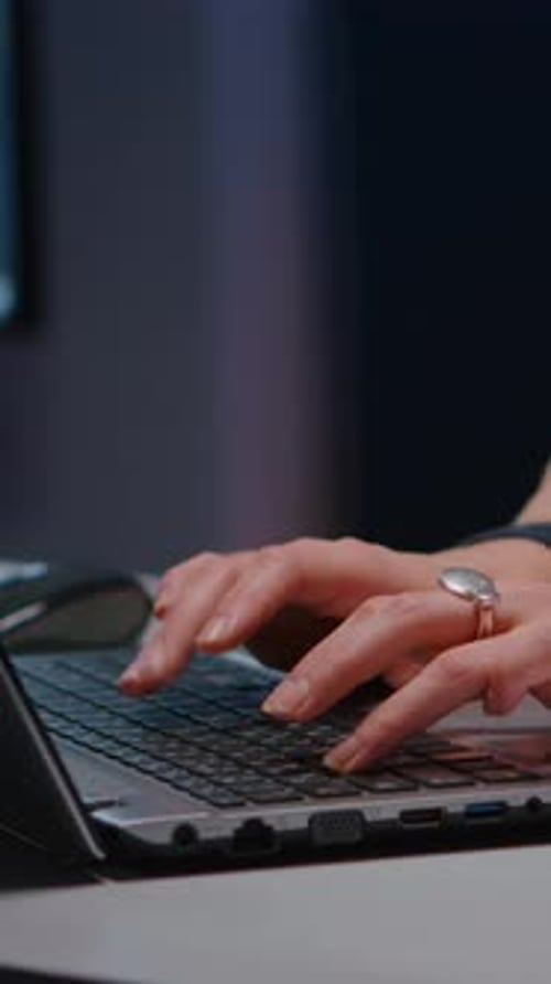 Closeup of Businesswoman Hands on Keyboard Sitting at Desk in Startup Company Office