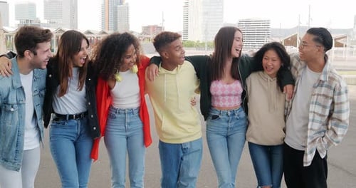 Group of Young Diverse Teenage Friends Having a Good Time in the Street