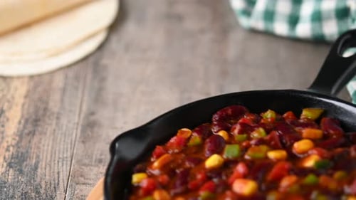 Close Up of Delicious Chili With Tortillas
