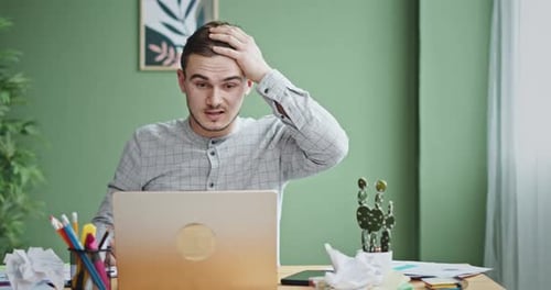 Male Manager Making Mistake During Work