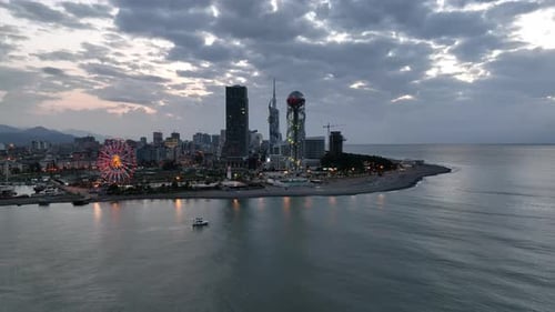 Aerial view of Batumi university and Alphabetic tower, skyscrapers and embankment of Batumi city