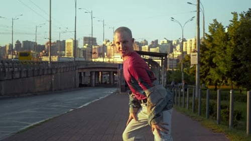 Dynamic Young Adult Dancer in Urban Cityscape