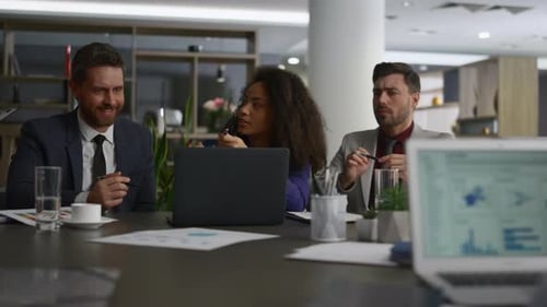 Diverse Managers Team Discuss Business Project Plan In Office. Employees Group Communicating Talk...