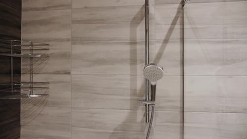 Shower on wall design in bathroom.