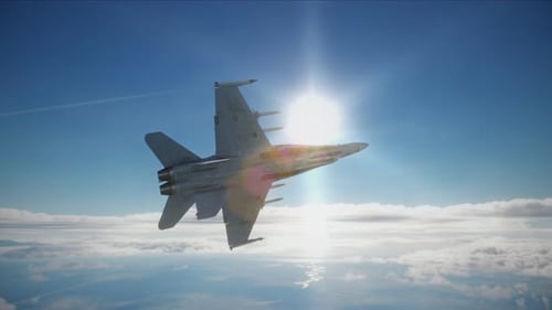 Military Aircraft Soaring Through the Sky