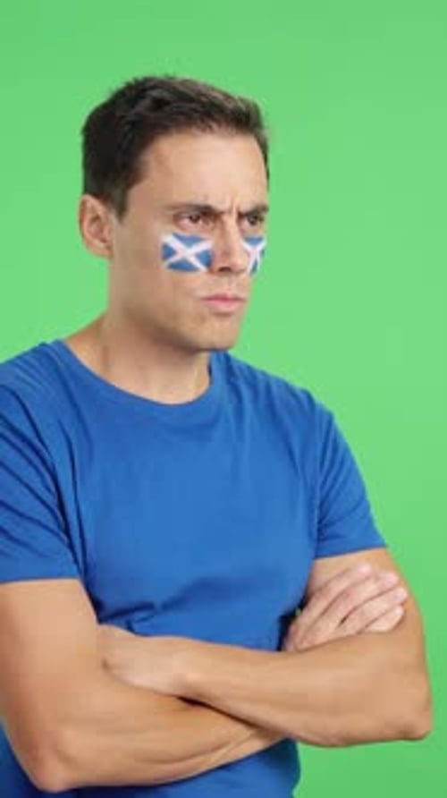 Man with Scottish Flag Paint on Face