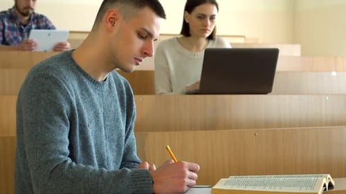 Students Learning in a Bright Lecture Hall
