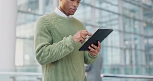 Tablet, research and business black man in office online for communication, networking and internet