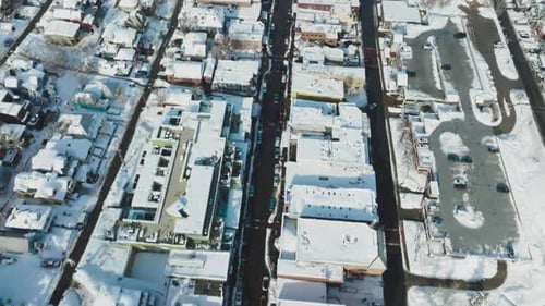 Flying over a Valley Covered in Snow shot on DJI Mavic 3