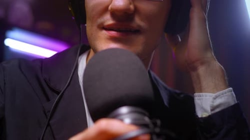 A Man a Journalist or Blogger Speaks Into the Microphone Starts a Podcast Creating an Audio Stream