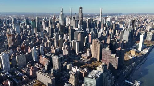 Aerial video above skyscrapers and skyline in Manhattan, New York