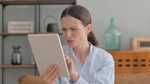 Woman with Tablet Shows Many Emotions