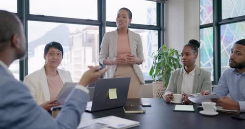 Team Meeting in Modern Urban Office Setting