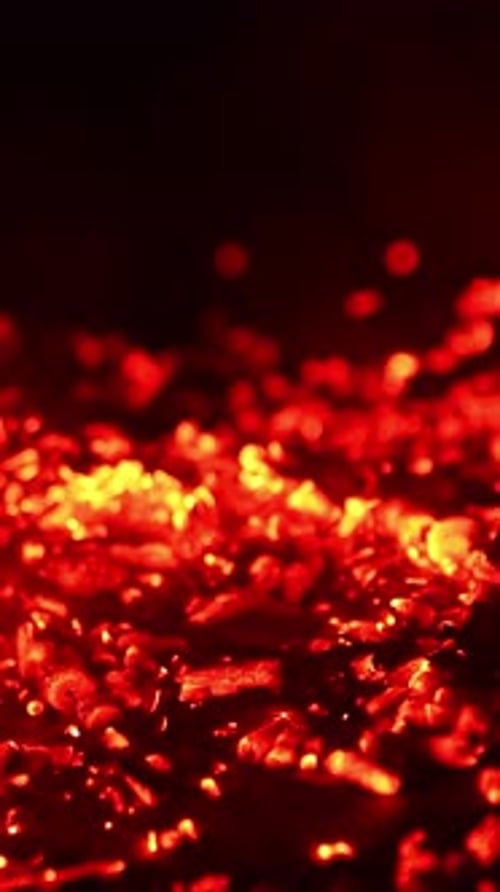 Glowing Red and Yellow Embers in the Dark