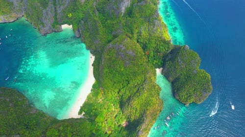 Aerial view over paradise island in tropical sea.