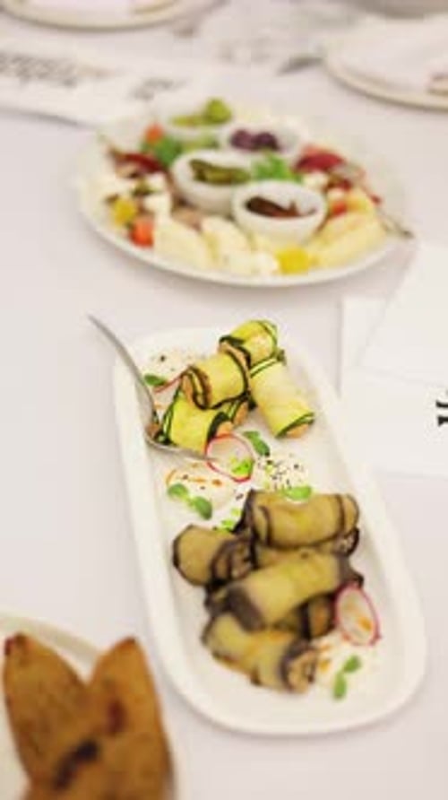 Eggplant And Zucchini Vegetable Rolls Appetizer On Serving Plate