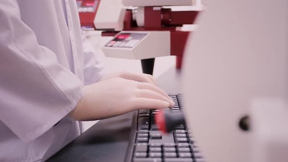 Hands Typing on Computer Keyboard in Laboratory, Science Stock Footage ...