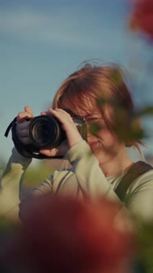Woman Taking Pictures with Digital Camera Outdoors