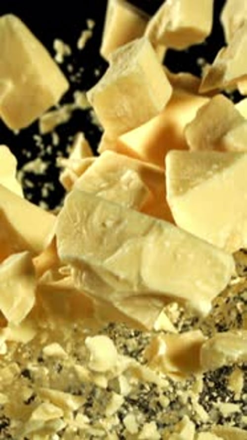 Super Slow Motion Pieces of White Chocolate Filmed on a Highspeed Camera at 1000 Fps
