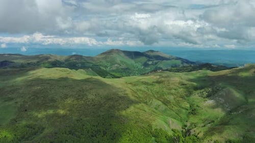 Clouds Over Summer Green Mountains