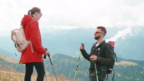 Hikers Taking a Break in the Mountains