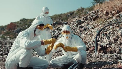 Scientists Studying Contamination at Waste Site