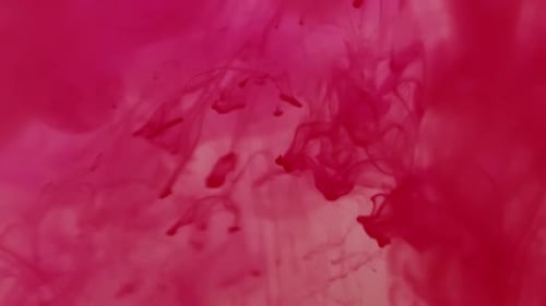 Red Ink Droplets Background Effect in Water