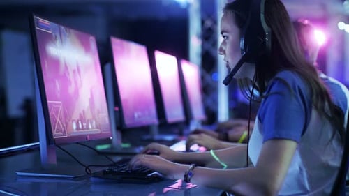 Focused gamers play a video game competition
