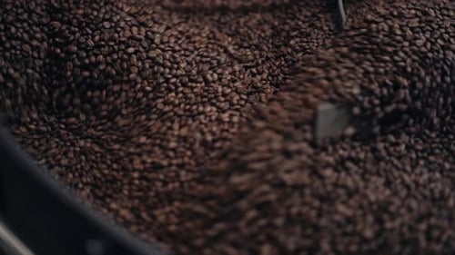 Roasted Coffee Beans Mixing in Roasting Machine