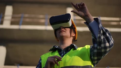 Construction Engineer Using VR on Building Site