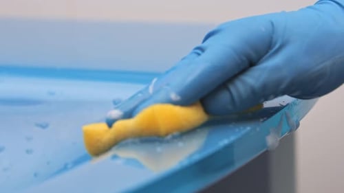 Hand Cleaning Blue Tub with Sponge and Soap