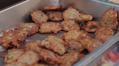 Tray of Crispy Fried Potato Pancakes