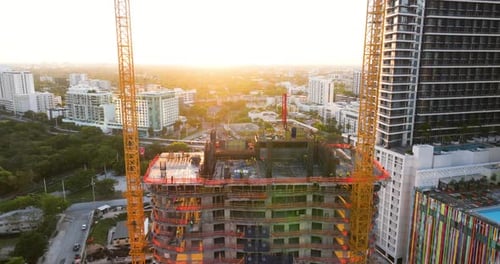 Real Estate Development in Miami Urban Area Tower Lifting Cranes at High Residential Apartment