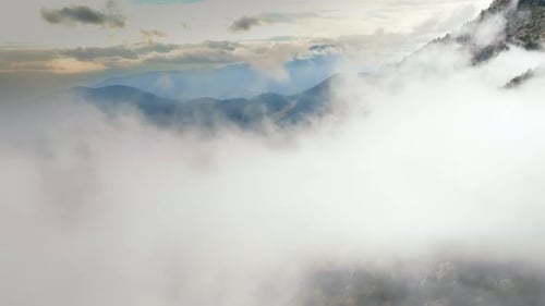 Exploring Misty Mountain Landscapes at Dawn in a Tranquil Wilderness Setting