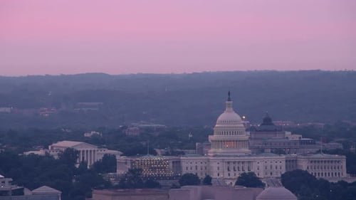 Washington dc aerial view of the capitol building and trump hotel at sunrise