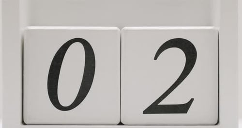 CloseUp of Number Zero and Two on White Blocks