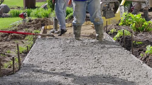 Concrete workers in slow motion