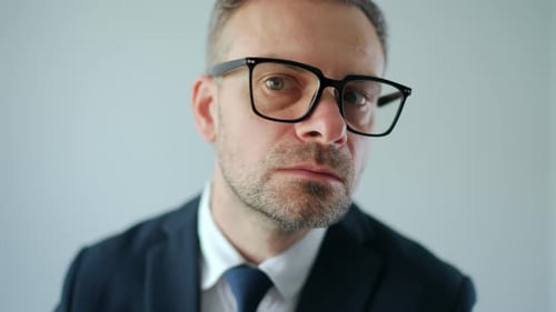 Confused Man In Suit Close Up