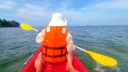 Asian Thai Women in Kayak on the River in Thailand