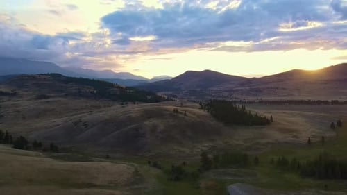 Aerial View of Rolling Hills at Sunrise or Sunset