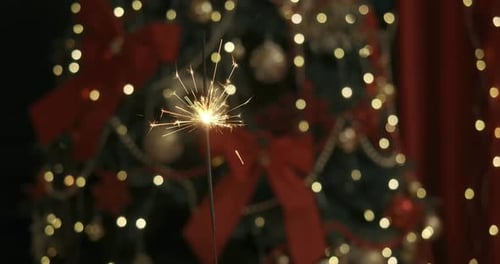 Sparkles Burning in Home Room Studio Decorated with Big Beautiful Christmas Tree