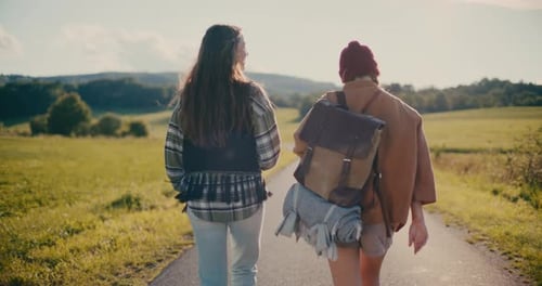 Young Happy Friends Walking On Footpath In Forest