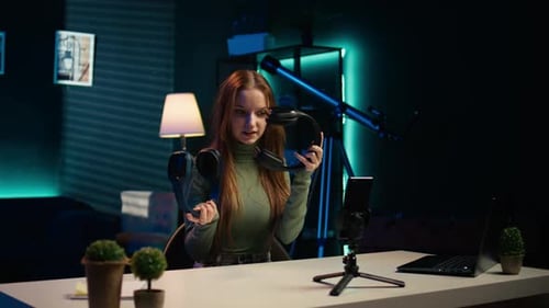 Young Content Creator Films Video Review of Book Browsing Through Pages