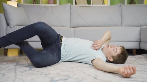 Teen Falls to Ground in Home Setting