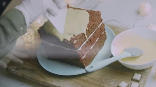 I Spread the Cream on the Square Cake Crusts Christmas Atmosphere with Lights in the Background