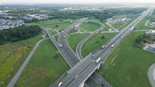 Cars Moving on Transport Road Junction in City Aerial View